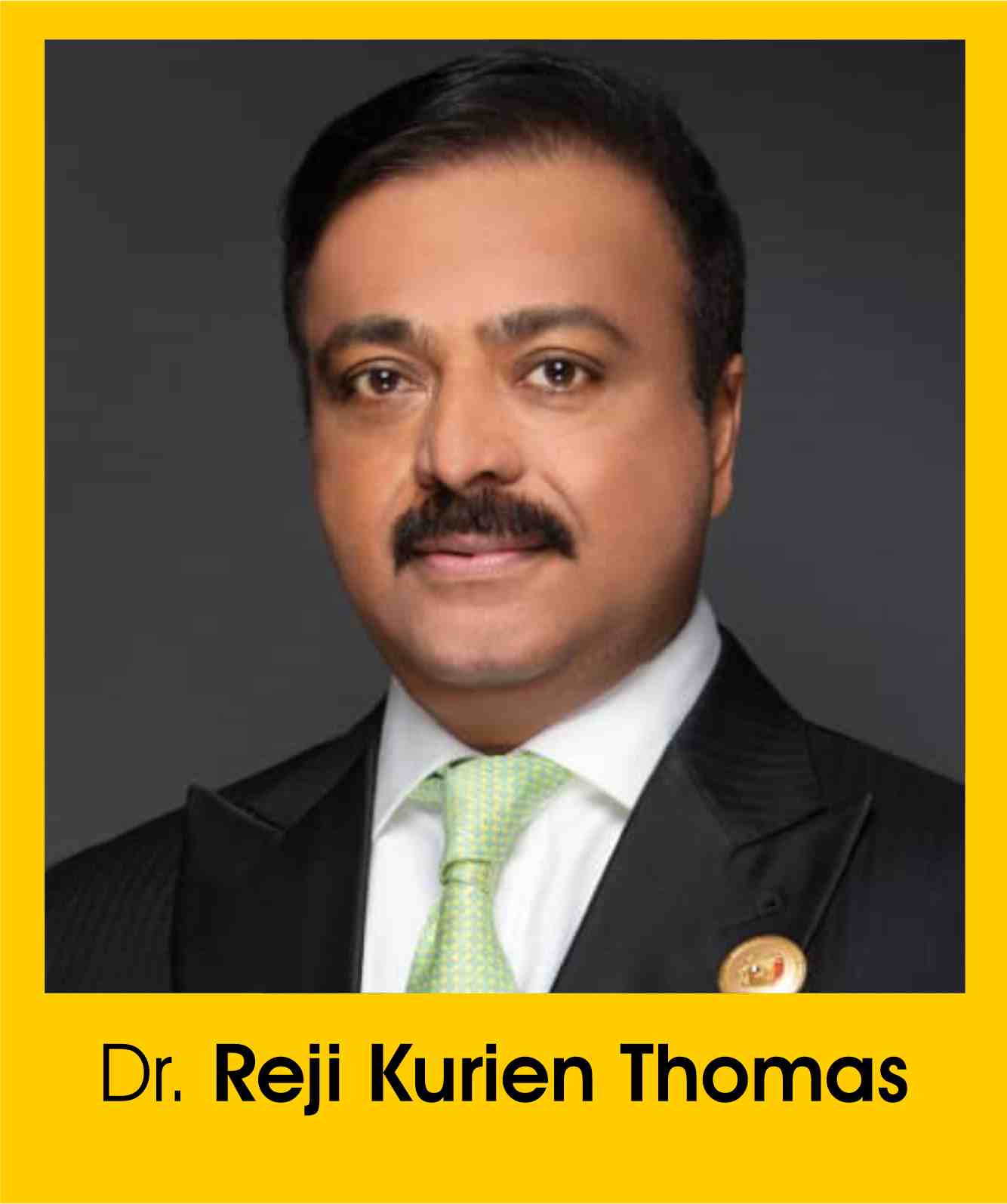 Dr. Reji Kurien Thomas